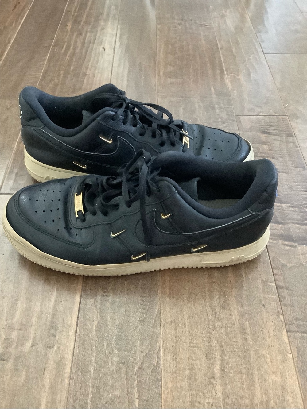 Nike Air Force 1 Men’s Black Low-Top Sneakers with Cream Sole and Gold Accents